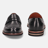 A black Men's bugatti Penny Loafer featuring a round apron toe, stacked heel, and a extra wide fit. Made from premium genuine leather with a durable eva outsole, this slip-on design offers both style and comfort.