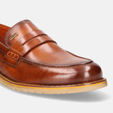 A cognac Men's bugatti Penny Loafer featuring a round apron toe, stacked heel, and a extra wide fit. Made from premium genuine leather with a durable eva outsole, this slip-on design offers both style and comfort.