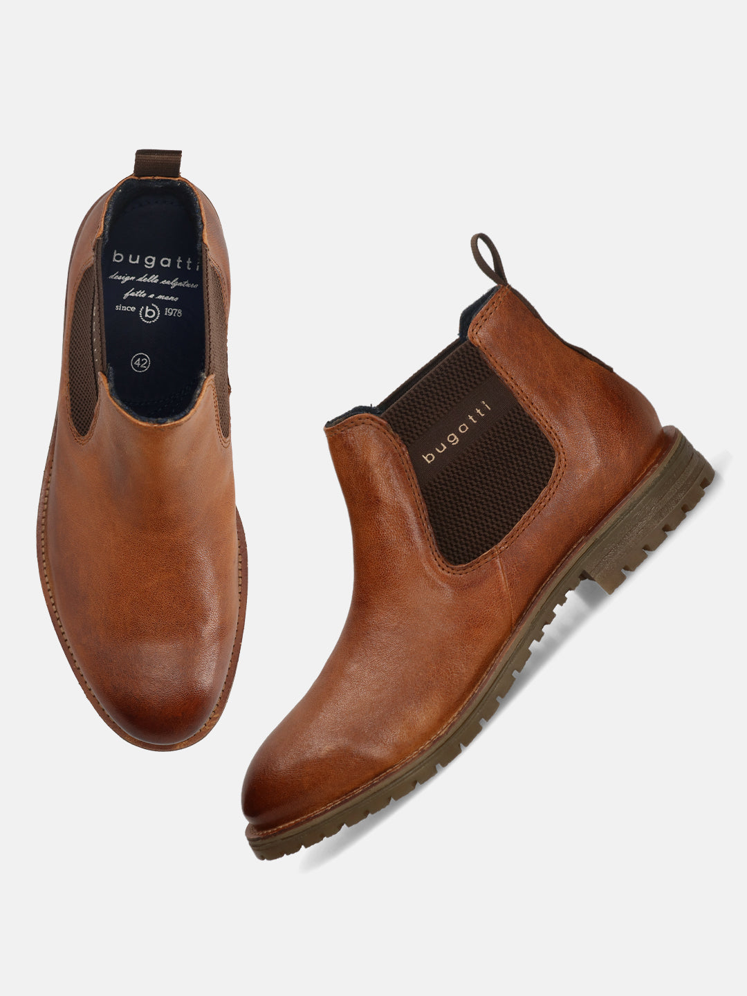 A cognac Men's bugatti Chelsea Boots featuring a round toe plain toe, moulded  heel, and a wide fit. Made from premium genuine leather with a durable tr outsole, this elastic design offers both style and comfort.