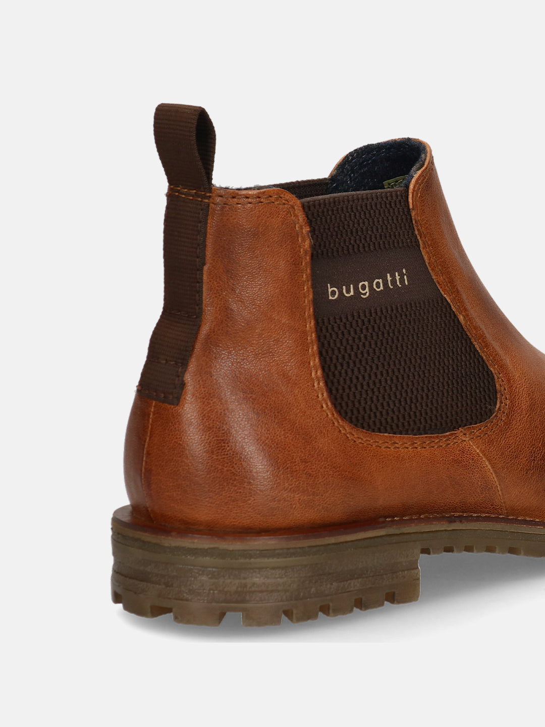 A cognac Men's bugatti Chelsea Boots featuring a round toe plain toe, moulded  heel, and a wide fit. Made from premium genuine leather with a durable tr outsole, this elastic design offers both style and comfort.