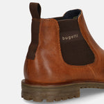 A cognac Men's bugatti Chelsea Boots featuring a round toe plain toe, moulded  heel, and a wide fit. Made from premium genuine leather with a durable tr outsole, this elastic design offers both style and comfort.