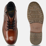 A cognac Men's bugatti Ankle Boots featuring a round toe plain toe, moulded heel, and a wide fit. Made from premium genuine leather with a durable tr outsole, this zipper design offers both style and comfort.