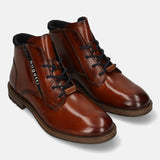 A cognac Men's bugatti Ankle Boots featuring a round toe plain toe, moulded heel, and a wide fit. Made from premium genuine leather with a durable tr outsole, this zipper design offers both style and comfort.