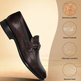 A grey Men's bugatti Bit Loafer featuring a round toe apron toe, stacked heel. Made from premium genuine leather with a durable leather outsole, this slip-on design offers both style and comfort.