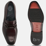 A grey Men's bugatti Bit Loafer featuring a round toe apron toe, stacked heel. Made from premium genuine leather with a durable leather outsole, this slip-on design offers both style and comfort.
