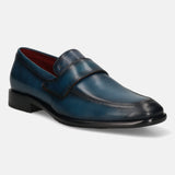 A blue Men's bugatti Penny Loafer featuring a round toe apron toe, stacked heel. Made from premium genuine leather with a durable leather outsole, this slip-on design offers both style and comfort.