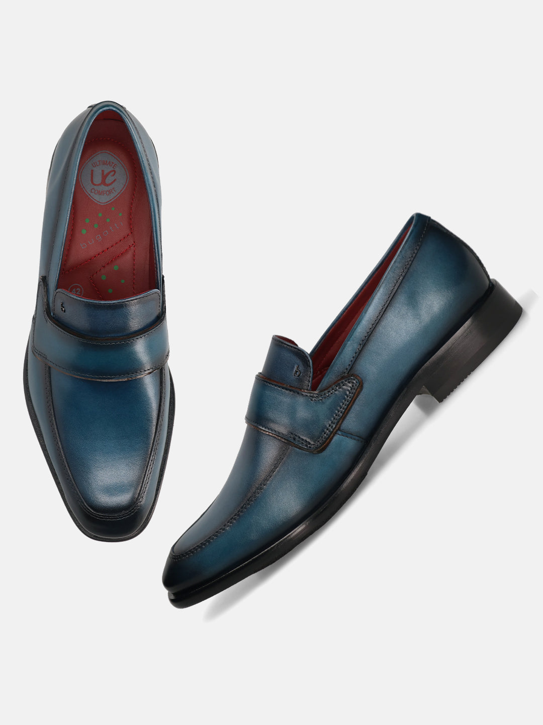 A blue Men's bugatti Penny Loafer featuring a round toe apron toe, stacked heel. Made from premium genuine leather with a durable leather outsole, this slip-on design offers both style and comfort.