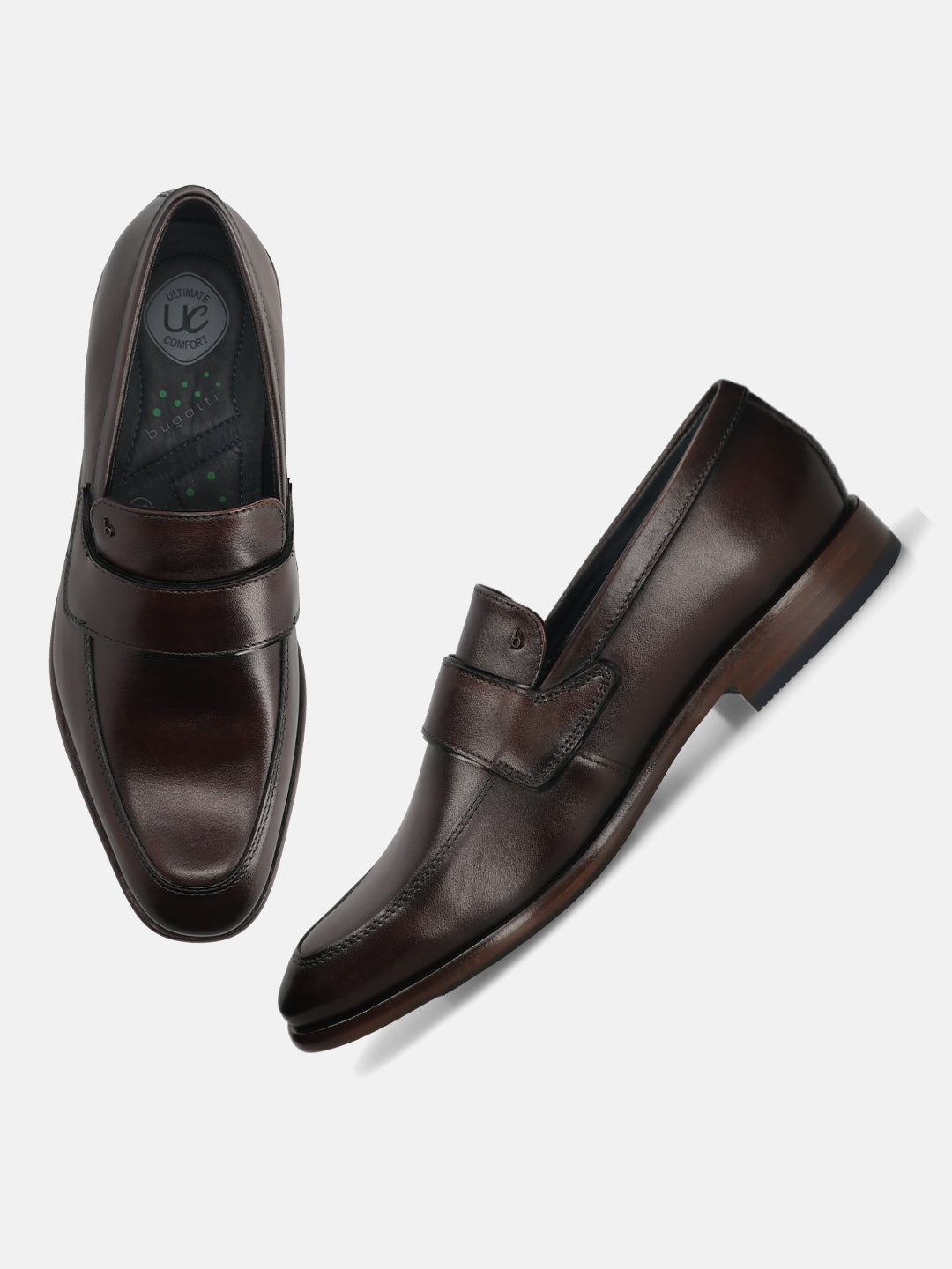 A brown Men's bugatti Penny Loafer featuring a round toe apron toe, stacked heel. Made from premium genuine leather with a durable leather outsole, this slip-on design offers both style and comfort.