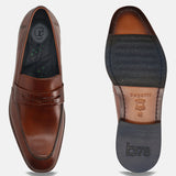 A cognac Men's bugatti Penny Loafer featuring a round toe apron toe, stacked heel. Made from premium genuine leather with a durable leather outsole, this slip-on design offers both style and comfort.