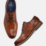 A cognac Men's bugatti Derby featuring a round toe plain toe, stacked heel. Made from premium genuine leather with a durable eva outsole, this laces design offers both style and comfort.