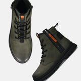 A green Men's bugatti Casual Boots featuring a round toe plain toe, stacked heel. Made from synthetic with a durable tpr outsole, this zipper design offers both style and comfort.