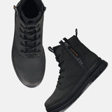 A black Men's bugatti Casual Boots featuring a round toe plain toe, stacked heel. Made from synthetic with a durable tpr outsole, this zipper design offers both style and comfort.