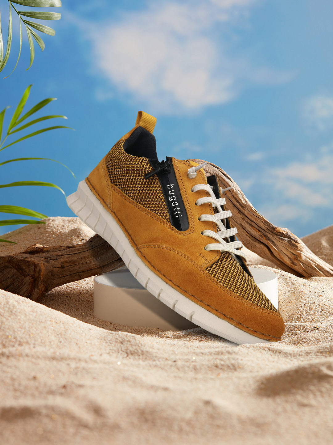 Men's Bugatti lifestyle yellow leather shoes with a round toe , a eva outsole , and laces fastening.