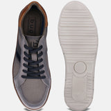 A grey Men's bugatti Sneakers featuring a round plain toe, zero heels heel. Made from textile with a durable tpr outsole, this laces design offers both style and comfort.
