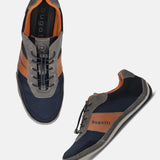 A grey Men's bugatti Sneakers featuring a round toe plain toe, zero heels heel. Made from premium genuine leather with a durable sebs (block copolymer) outsole, this laces design offers both style and comfort.