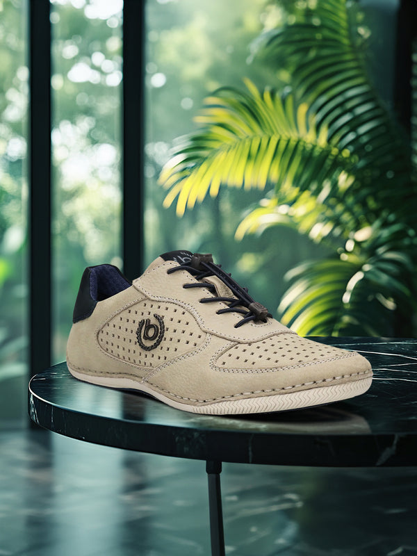 A grey Men's bugatti Sneakers featuring a round toe plain toe, zero heels heel. Made from premium genuine leather with a durable sebs (block copolymer) outsole, this elastic design offers both style and comfort.