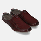A grey Men's bugatti Mules featuring a round toe plain toe, zero heels heel. Made from premium genuine leather with a durable sebs (block copolymer) outsole, this slip-on design offers both style and comfort.