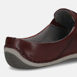 A grey Men's bugatti Mules featuring a round toe plain toe, zero heels heel. Made from premium genuine leather with a durable sebs (block copolymer) outsole, this slip-on design offers both style and comfort.