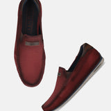 A grey Men's bugatti Casual Loafers featuring a square toe apron toe, zero heels heel. Made from premium genuine leather with a durable tr outsole, this slip-on design offers both style and comfort.