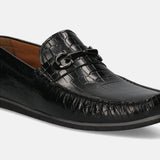 A black Men's bugatti Casual Loafers featuring a square toe apron toe, zero heels heel. Made from patent leather with a durable tr outsole, this slip-on design offers both style and comfort.