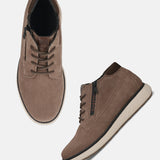 A taupe Men's bugatti Sneakers featuring a round toe plain toe, zero heels heel, and a wide fit. Made from premium genuine leather with a durable tpr outsole, this zipper design offers both style and comfort.