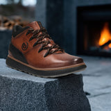 A brown Men's bugatti Sneakers featuring a round toe plain toe, zero heels heel, and a wide fit. Made from premium genuine leather with a durable tpr outsole, this zipper design offers both style and comfort.