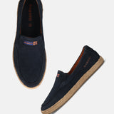 A blue Men's bugatti Casual Loafers featuring a round toe apron toe, zero heels heel. Made from premium genuine leather with a durable tpr outsole, this slip-on design offers both style and comfort.