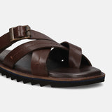 A brown Men's bugatti Cross Strap Sandals featuring a open toe plain toe, zero heels heel, and a wide fit. Made from premium genuine leather with a durable eva outsole, this slip-on design offers both style and comfort.