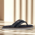 A blue Men's bugatti Thongs featuring a round open toe, zero heels heel, and a wide fit. Made from premium genuine leather with a durable eva outsole, this slip-on design offers both style and comfort.