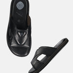 A black Men's bugatti Mules featuring a round toe plain toe, zero heels heel, and a wide fit. Made from premium genuine leather with a durable eva outsole, this slip-on design offers both style and comfort.