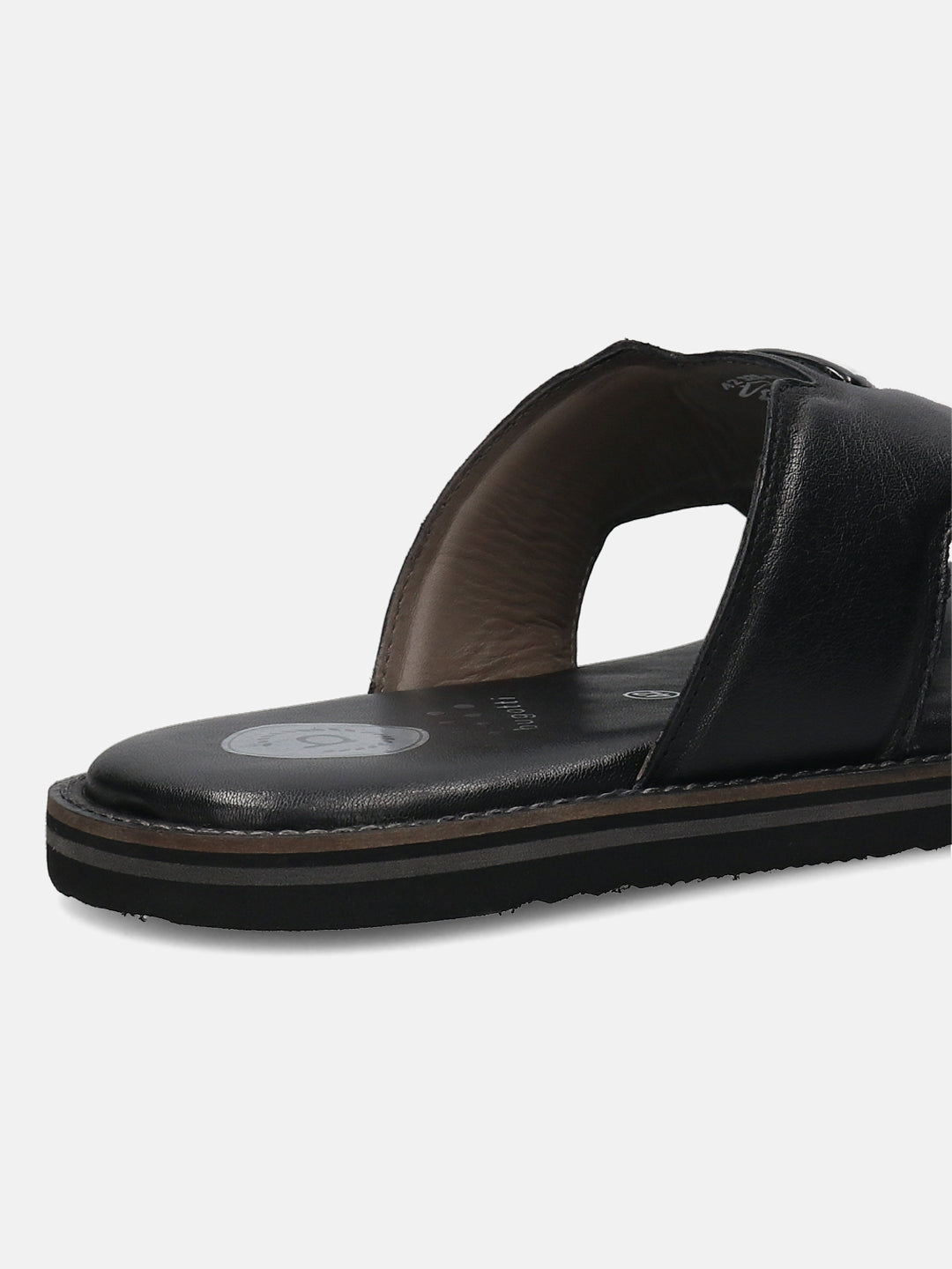A black Men's bugatti Mules featuring a round toe plain toe, zero heels heel, and a wide fit. Made from premium genuine leather with a durable eva outsole, this slip-on design offers both style and comfort.