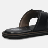 A black Men's bugatti Mules featuring a round toe plain toe, zero heels heel, and a wide fit. Made from premium genuine leather with a durable eva outsole, this slip-on design offers both style and comfort.