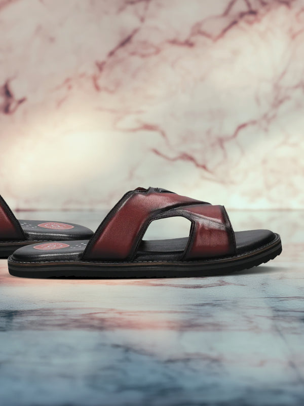 A grey Men's bugatti Mules featuring a round toe plain toe, zero heels heel, and a wide fit. Made from premium genuine leather with a durable eva outsole, this slip-on design offers both style and comfort.