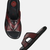 A grey Men's bugatti Mules featuring a round toe plain toe, zero heels heel, and a wide fit. Made from premium genuine leather with a durable eva outsole, this slip-on design offers both style and comfort.