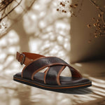 A brown Men's bugatti Back Strap Sandals featuring a open toe plain toe, zero heels heel, and a wide fit. Made from premium genuine leather with a durable eva outsole, this buckle design offers both style and comfort.