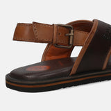 A brown Men's bugatti Back Strap Sandals featuring a open toe plain toe, zero heels heel, and a wide fit. Made from premium genuine leather with a durable eva outsole, this buckle design offers both style and comfort.