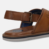 A cognac Men's bugatti Back Strap Sandals featuring a open toe plain toe, zero heels heel, and a wide fit. Made from premium genuine leather with a durable eva outsole, this buckle design offers both style and comfort.