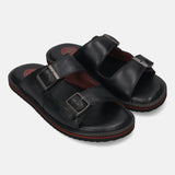 A black Men's bugatti Mules featuring a round toe plain toe, zero heels heel. Made from premium genuine leather with a durable eva outsole, this slip-on design offers both style and comfort.