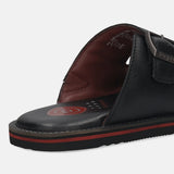 A black Men's bugatti Mules featuring a round toe plain toe, zero heels heel. Made from premium genuine leather with a durable eva outsole, this slip-on design offers both style and comfort.