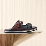 A blue Men's bugatti Mules featuring a round toe plain toe, zero heels heel. Made from premium genuine leather with a durable eva outsole, this slip-on design offers both style and comfort.