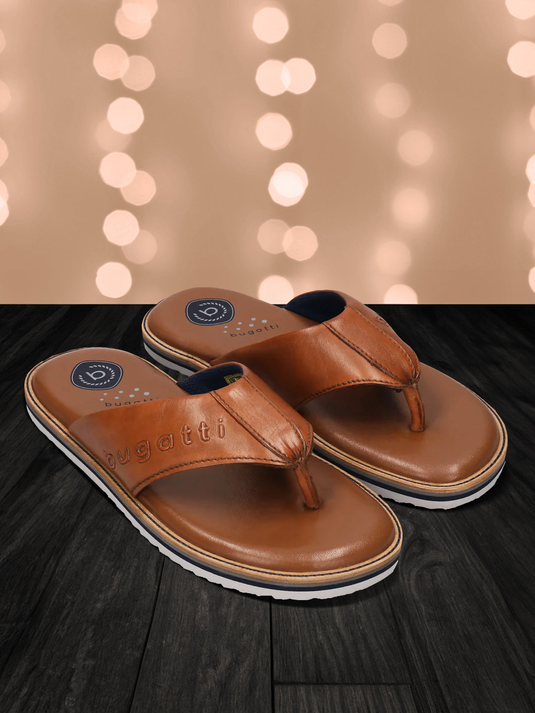 A cognac Men's bugatti Thongs featuring a open toe plain toe, zero heels heel, and a wide fit. Made from premium genuine leather with a durable eva outsole, this slip-on design offers both style and comfort.
