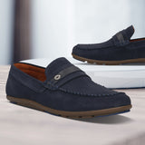 Men's Bugatti drivers blue leather shoes with a round toe and apron toe , a rubber outsole.