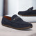 Men's Bugatti drivers blue leather shoes with a round toe and apron toe , a rubber outsole.