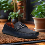 A blue Men's bugatti Drivers featuring a square toe apron toe, zero heels heel. Made from premium genuine leather with a durable rubber outsole, this slip-on design offers both style and comfort.