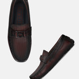 A grey Men's bugatti Drivers featuring a square toe apron toe, zero heels heel. Made from premium genuine leather with a durable rubber outsole, this slip-on design offers both style and comfort.