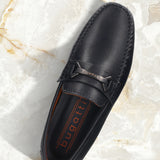 Men's Bugatti drivers blue leather shoes with a round toe and apron toe , a rubber outsole.