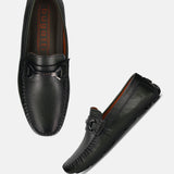 Men's Bugatti drivers green leather shoes with a round toe and apron toe , a rubber outsole.