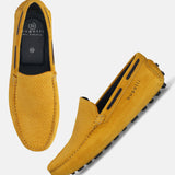 A yellow Men's bugatti Drivers featuring a square toe apron toe, zero heels heel. Made from premium genuine leather with a durable pu outsole, this slip-on design offers both style and comfort.