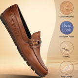 A cognac Men's bugatti Drivers featuring a round toe apron toe, zero heels heel. Made from premium genuine leather with a durable rubber outsole, this slip-on design offers both style and comfort.