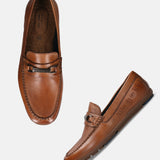 A cognac Men's bugatti Drivers featuring a round toe apron toe, zero heels heel. Made from premium genuine leather with a durable rubber outsole, this slip-on design offers both style and comfort.